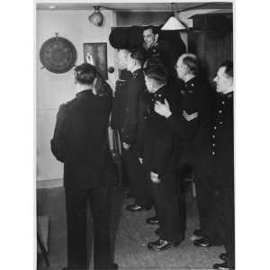 Metropolitan Police Officers Relaxing Playing a Game of Darts 