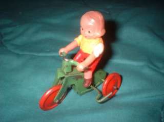 OCCUPIED JAPAN CELLULOID GIRL ON TRICYCLE WIND UP TOY 