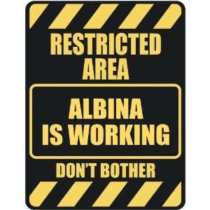   RESTRICTED AREA ALBINA IS WORKING  PARKING SIGN