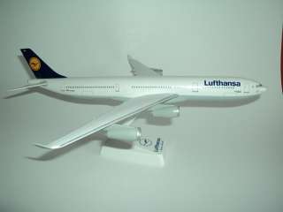 This is a detailed plastic model of an Airbus A340 300 in the colours 