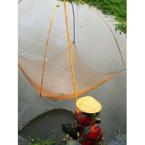  Woman Raising Fixed Fishing Net, Vang Vieng, Vientiane 