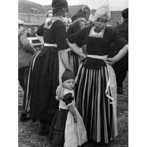 Dutch Women and Child in Traditional Dress at a Soccer Match Stretched 