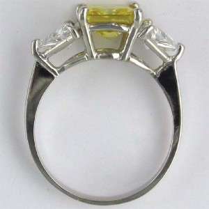 stone ring with princess cut cubic zirconia in the center and triangle 