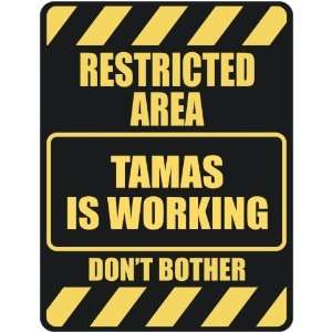   RESTRICTED AREA TAMAS IS WORKING  PARKING SIGN