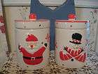 Cookie Jars CHRISTMAS matching  santa on one and a snow