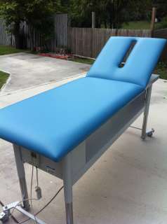 Electric Massage Table with Adjustable Back. Made by TRI W G  