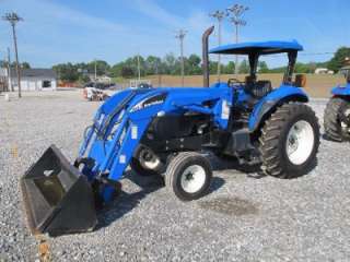 NEW HOLLAND TB100 TRACTOR WITH LOADER, 200 HOURS, NICE  