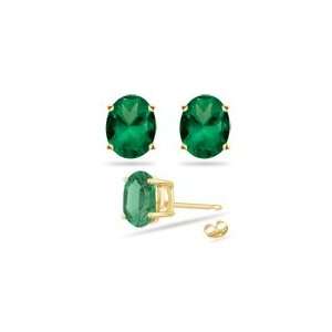  0.75 0.97 Cts of 6x4 mm AA Oval Emerald Stud Earrings in 