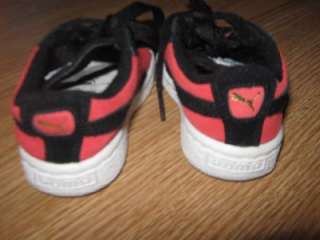 pair of PUMA KINDER FIT BLACK RED SUEDE SNEAKERS SZ 3. These sneakers 