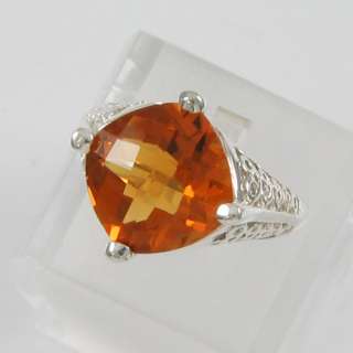   shaped and checkerboard cut citrine for that extra sparkle weighs