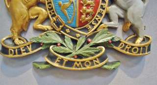   along the bottom of the plaque being the motto of the British Monarch