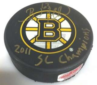 Brad Marchand Boston Bruins signed puck with Stanley Cup Champs 