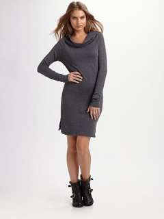 Funnel neck Long dolman sleeves Side slits at hem About 37 from 