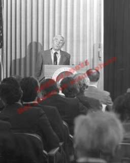   french undersea researcher is shown addressing members of the press