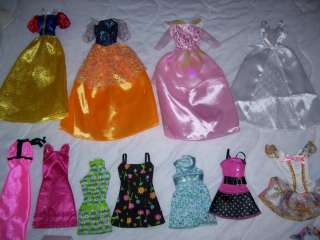   55 PIECES OF DOLL CLOTHES FOR BARBIE & 2 DRESSED KELLY DOLLS  