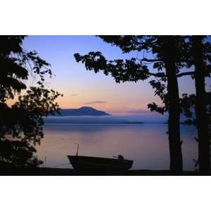  Silhouette of a Motor Boat on the Shores of a Bay in 